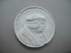Tirage d'une médaille : buste de profil
