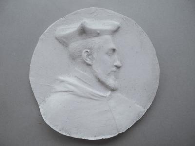Tirage d'une médaille : buste d'homme barbu