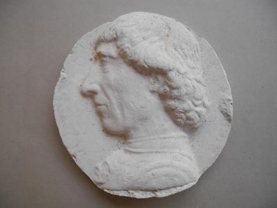 Tirage d'une médaille : buste d'homme de profil gauche