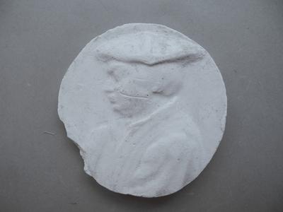 Tirage d'une médaille : buste d'homme de profil
