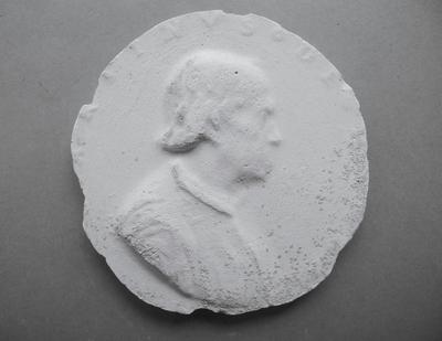 Tirage d'une médaille : buste d'homme de profil