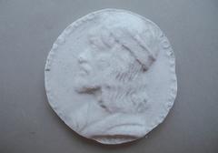 Tirage d'une médaille : buste d'homme de profil gauche