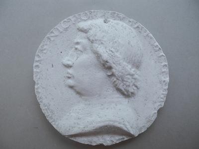 Tirage d'une médaille : buste d'homme de profil gauche