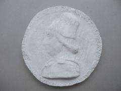 Tirage d'une médaille : buste de profil gauche