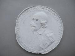Tirage d'une médaille : buste de Charles de l'Aubépine