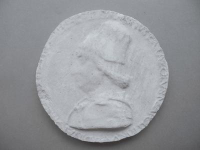 Tirage d'une médaille : buste de profil gauche