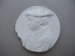 Tirage d'une médaille : buste d'homme de profil