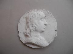 Tirage d'une médaille : buste d'homme de profil droit