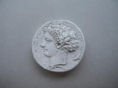 Tirage d'une monnaie : tête de profil gauche