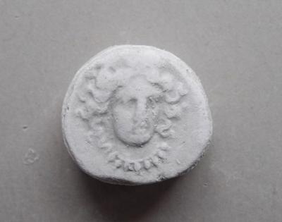 Tirage d'une monnaie : tête de face