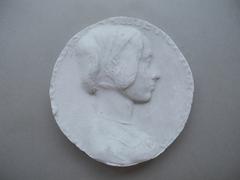 Tirage d'une médaille : buste féminin de profil droit