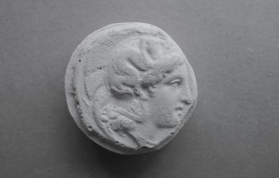 Tirage d'une monnaie : tête de profil droit