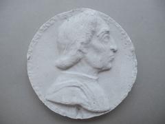 Tirage d'une médaille : buste d'homme de profil droit