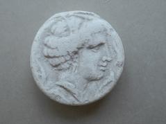 Tirage d'une monnaie : tête de profil droit