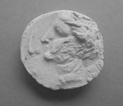 Tirage d'une monnaie : tête de profil gauche