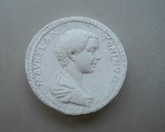 Tirage d'une monnaie : tête de profil droit