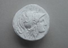 Tirage d'une monnaie : tête de profil droit