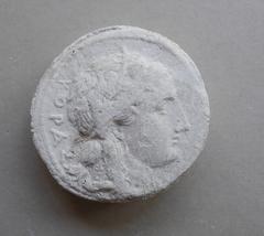 Tirage d'une monnaie : tête de profil droit