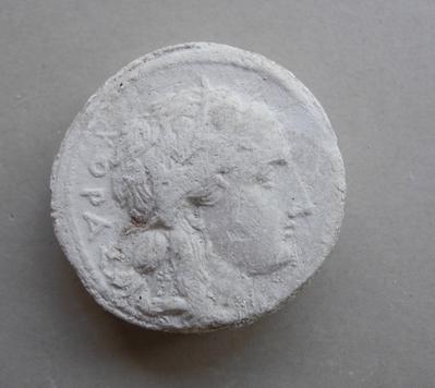 Tirage d'une monnaie : tête de profil droit