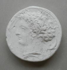 Tirage d'une monnaie : tête de profil gauche