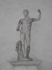 Statue masculine nue avec tête rapportée