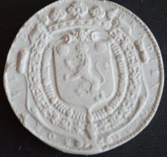 Tirage d'une médaille : armes de la famille de Bonne