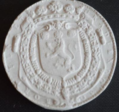 Tirage d'une médaille : armes de la famille de Bonne